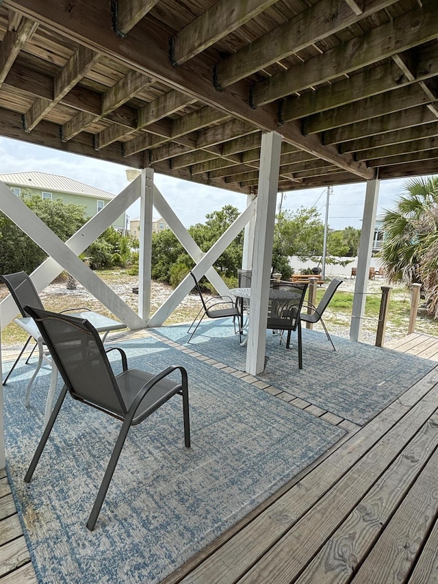 101 Barbados Dr, Cape San Blas, FL 32456 - wooden terrace featuring outdoor dining space