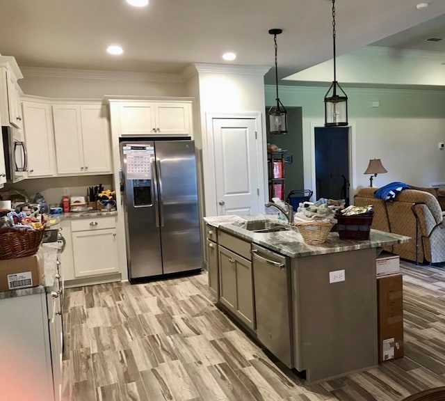 95 Santana Dr, Santa Rosa Beach, FL 32459 - kitchen featuring stainless steel appliances, a sink, ornamental molding, white cabinetry, and recessed lighting