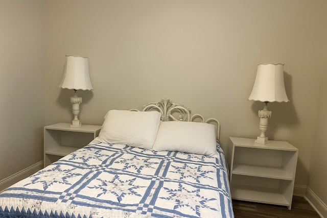 95 Santana Dr, Santa Rosa Beach, FL 32459 - bedroom featuring baseboards and dark wood-style floors