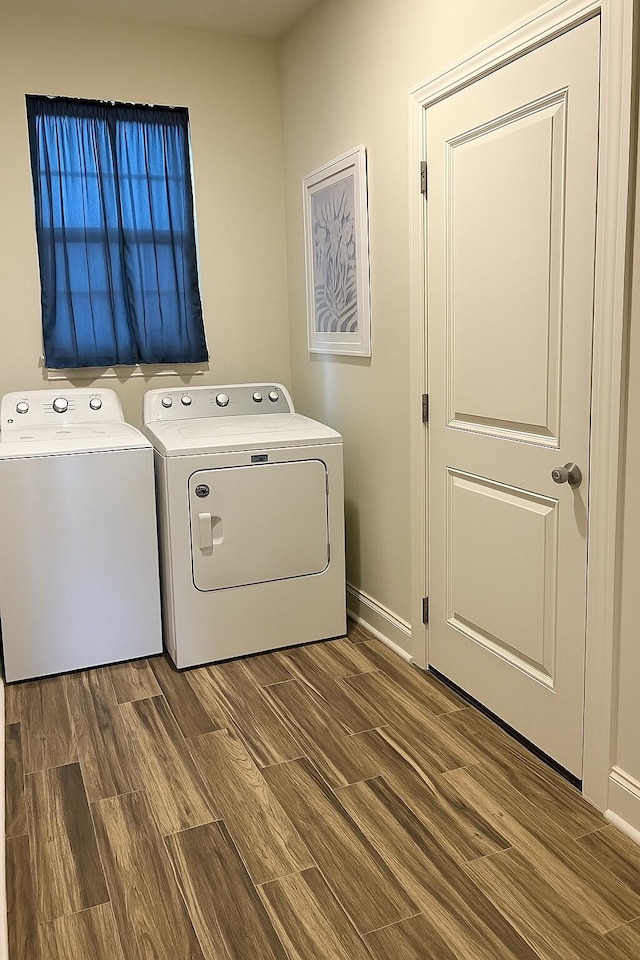 95 Santana Dr, Santa Rosa Beach, FL 32459 - laundry area featuring separate washer and dryer and wood finished floors