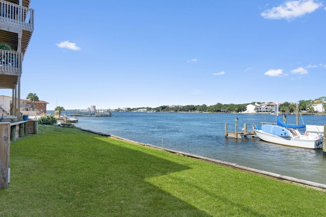 330 Bluefish Dr Unit 119, Fort Walton Beach, FL 32548 - dock with a water view and a yard
