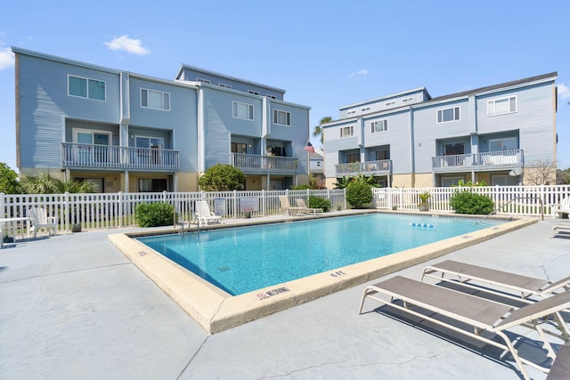 330 Bluefish Dr Unit 119, Fort Walton Beach, FL 32548 - community pool featuring a patio area and a residential view