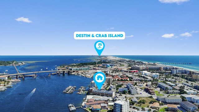 330 Bluefish Dr Unit 119, Fort Walton Beach, FL 32548 - drone / aerial view of a nearby body of water and a notable bridge