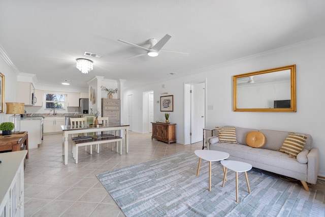330 Bluefish Dr Unit 119, Fort Walton Beach, FL 32548 - living area with crown molding, ceiling fan, light tile patterned floors, and baseboards