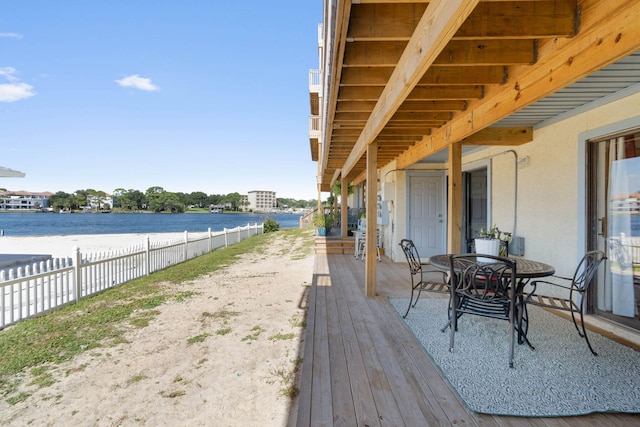 330 Bluefish Dr Unit 119, Fort Walton Beach, FL 32548 - wooden deck featuring a water view