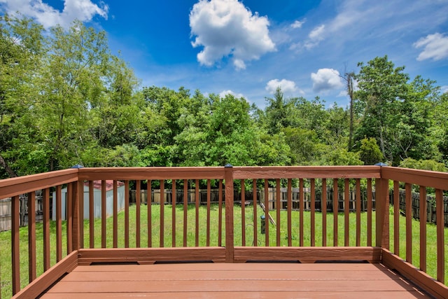 712 Riva Ridge Dr, Crestview, FL 32539 - wooden deck with a fenced backyard