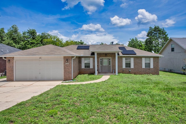 712 Riva Ridge Dr, Crestview, FL 32539 - single story home featuring brick siding, a garage, a front lawn, and driveway
