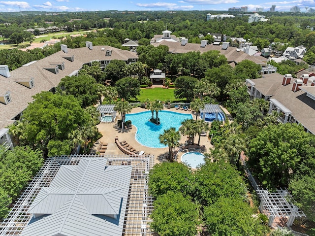9100 Baytowne Wharf Blvd Unit 366-8, Miramar Beach, FL 32550 - aerial perspective of suburban area with a pool area and a tree filled landscape