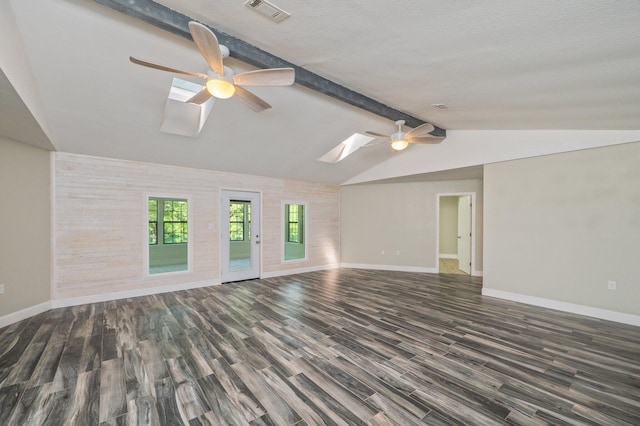 6859 Bill Lundy Rd, Laurel Hill, FL 32567 - unfurnished living room with ceiling fan, a skylight, baseboards, and wood finished floors