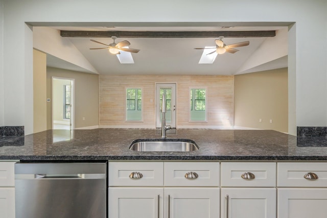 6859 Bill Lundy Rd, Laurel Hill, FL 32567 - kitchen featuring stainless steel dishwasher, ceiling fan, a sink, white cabinets, and dark stone counters