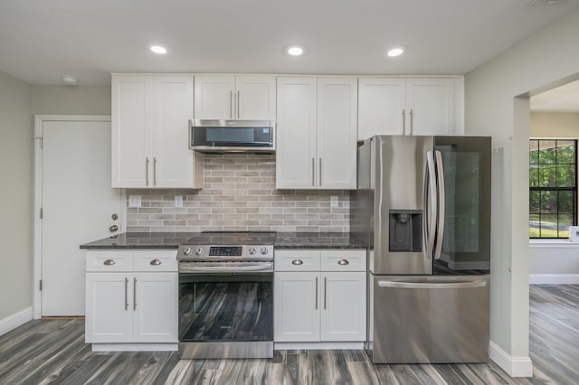 6859 Bill Lundy Rd, Laurel Hill, FL 32567 - kitchen with appliances with stainless steel finishes, baseboards, dark wood-style flooring, and recessed lighting
