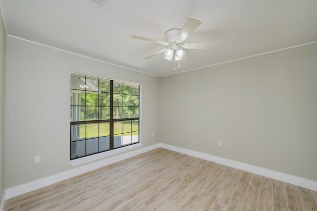 6859 Bill Lundy Rd, Laurel Hill, FL 32567 - empty room with wood finished floors, baseboards, and a ceiling fan