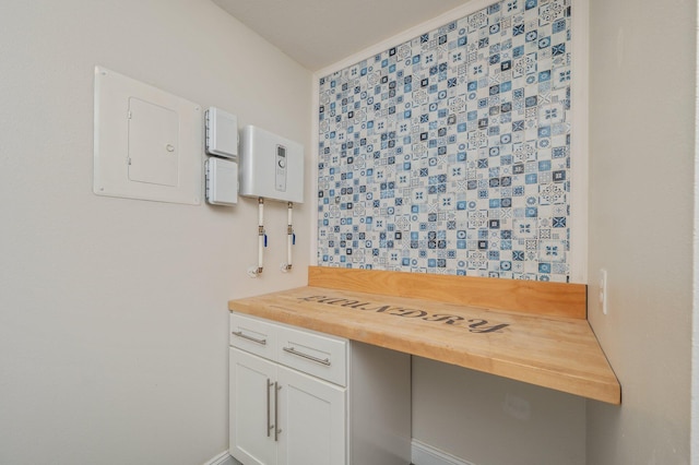 6859 Bill Lundy Rd, Laurel Hill, FL 32567 - bathroom with electric panel and baseboards
