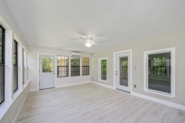 6859 Bill Lundy Rd, Laurel Hill, FL 32567 - unfurnished sunroom with a wall mounted air conditioner