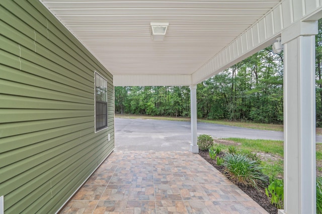 6859 Bill Lundy Rd, Laurel Hill, FL 32567 - view of patio / terrace featuring a carport