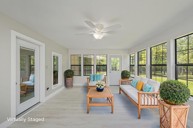 6859 Bill Lundy Rd, Laurel Hill, FL 32567 - sunroom featuring healthy amount of natural light and wood finished floors