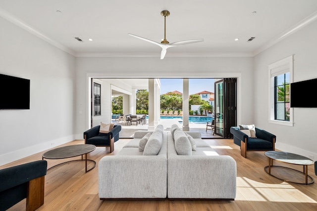 5012 W County Highway 30a, Santa Rosa Beach, FL 32459 - living room featuring ornamental molding, light wood-type flooring, recessed lighting, ceiling fan, and baseboards