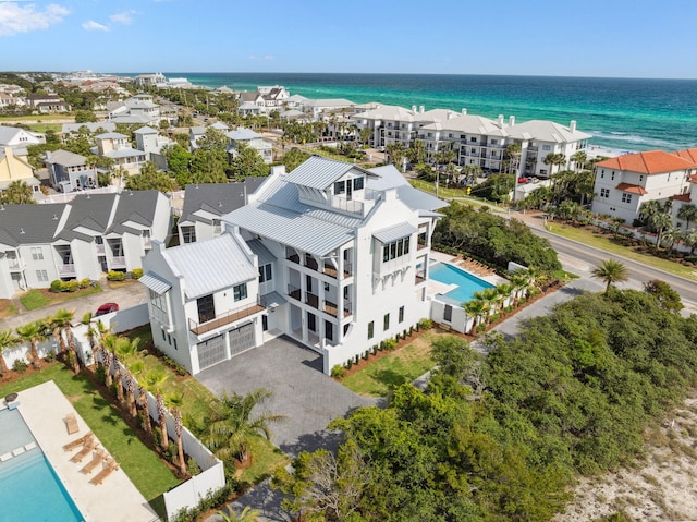 5012 W County Highway 30a, Santa Rosa Beach, FL 32459 - drone / aerial view of a pool and a nearby body of water