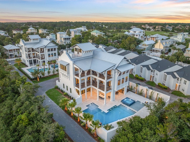 5012 W County Highway 30a, Santa Rosa Beach, FL 32459 - aerial view at dusk of view of pool and a residential view