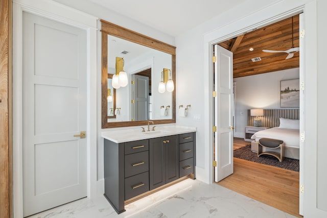 5012 W County Highway 30a, Santa Rosa Beach, FL 32459 - bathroom with marble finish flooring and vanity