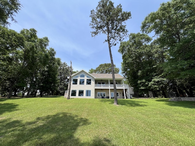 275 Lake Holley Cir, Defuniak Springs, FL 32433 - rear view of house with a yard