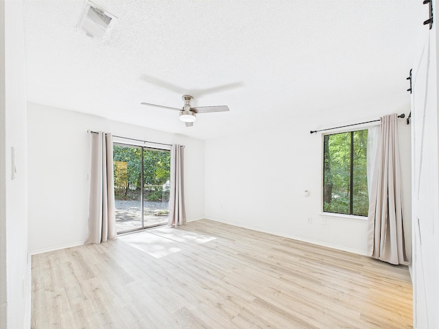 1000 Bay Dr Unit 524, Niceville, FL 32578 - spare room featuring light wood-type flooring and a ceiling fan