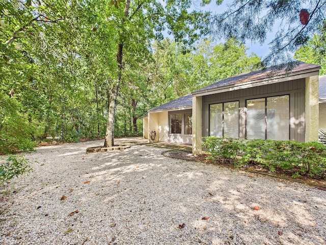 1000 Bay Dr Unit 524, Niceville, FL 32578 - rear view of property featuring roof with shingles