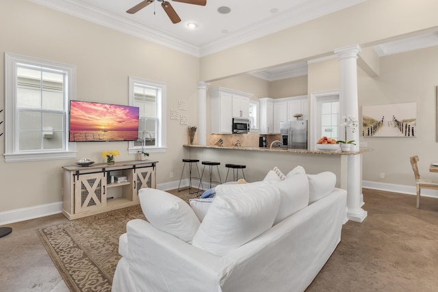 130 Palmeira Way, Santa Rosa Beach, FL 32459 - living room featuring a ceiling fan, ornamental molding, ornate columns, baseboards, and recessed lighting