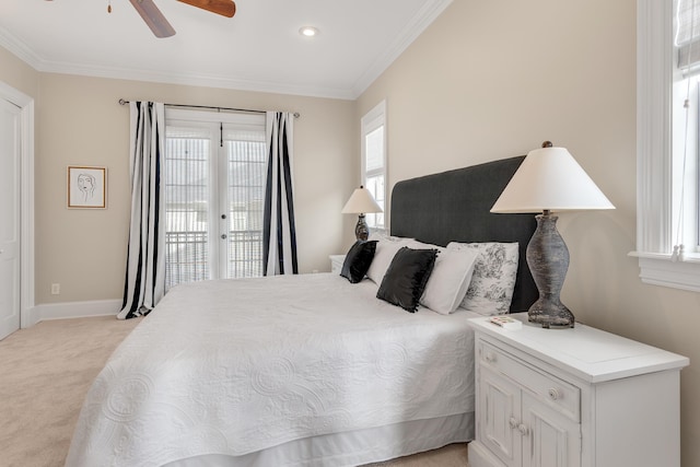 130 Palmeira Way, Santa Rosa Beach, FL 32459 - bedroom featuring access to outside, light colored carpet, multiple windows, crown molding, and recessed lighting