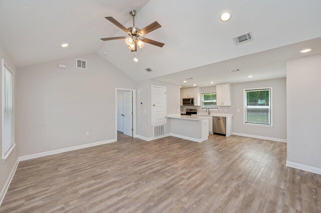 192 S Norwood Rd, Defuniak Springs, FL 32435 - unfurnished living room with ceiling fan, light wood-style floors, a sink, baseboards, and recessed lighting