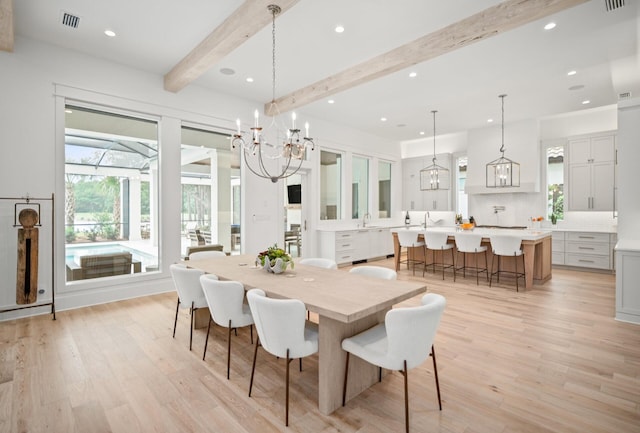 3502 Burnt Pine Ln, Miramar Beach, FL 32550 - dining space with beam ceiling, light wood-style flooring, a chandelier, and recessed lighting