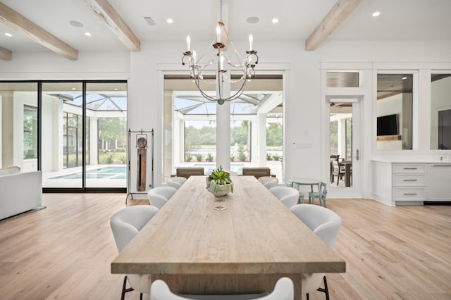 3502 Burnt Pine Ln, Miramar Beach, FL 32550 - dining area featuring beamed ceiling, a chandelier, light wood-style flooring, and recessed lighting