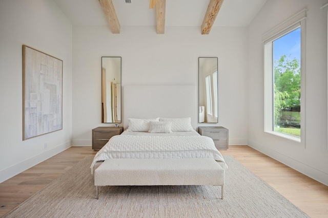 3502 Burnt Pine Ln, Miramar Beach, FL 32550 - bedroom with wood finished floors and beam ceiling