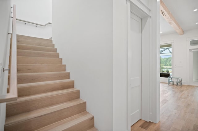 3502 Burnt Pine Ln, Miramar Beach, FL 32550 - stairway with beamed ceiling and wood finished floors
