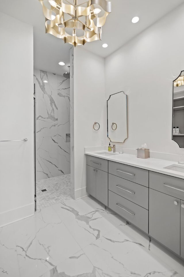 3502 Burnt Pine Ln, Miramar Beach, FL 32550 - bathroom with marble finish floors, a marble finish shower, double vanity, recessed lighting, and a chandelier