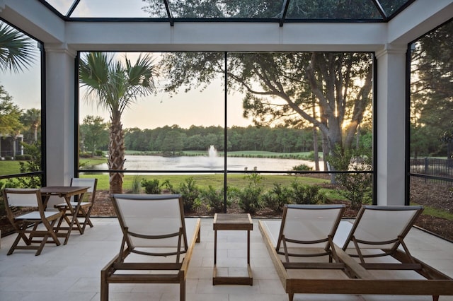 3502 Burnt Pine Ln, Miramar Beach, FL 32550 - sunroom / solarium featuring a water view and tile patterned floors