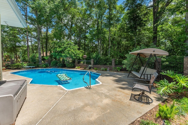 6087 Terrace Ln, Crestview, FL 32536 - view of pool with a patio and view of scattered trees