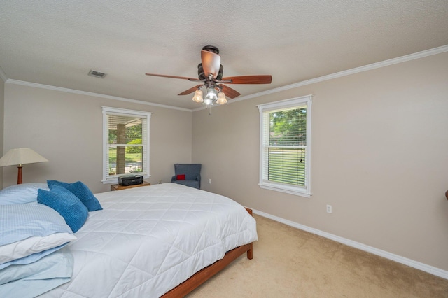 6087 Terrace Ln, Crestview, FL 32536 - bedroom with multiple windows, light colored carpet, ornamental molding, baseboards, and a ceiling fan