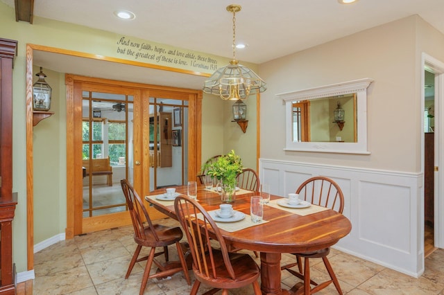 6087 Terrace Ln, Crestview, FL 32536 - dining space with french doors, recessed lighting, wainscoting, and a chandelier