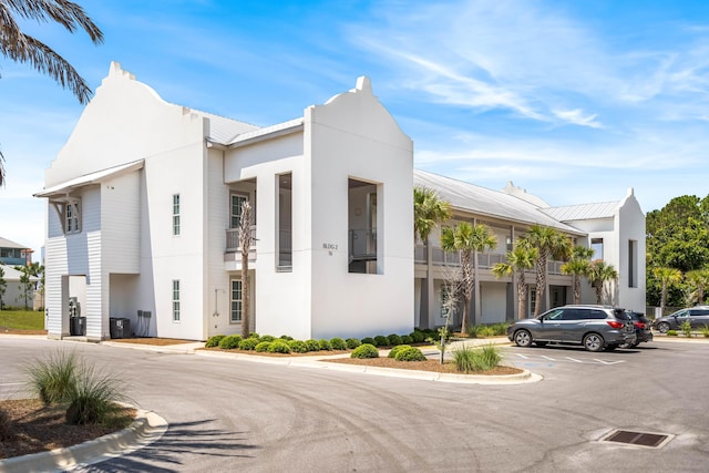 70 Martha S Ln # 2-101, Santa Rosa Beach, FL 32459 - view of property featuring uncovered parking