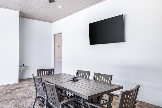 70 Martha S Ln # 2-101, Santa Rosa Beach, FL 32459 - dining space with wooden ceiling, recessed lighting, and brick floors