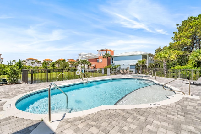 70 Martha S Ln # 2-101, Santa Rosa Beach, FL 32459 - community pool featuring a patio area and a residential view