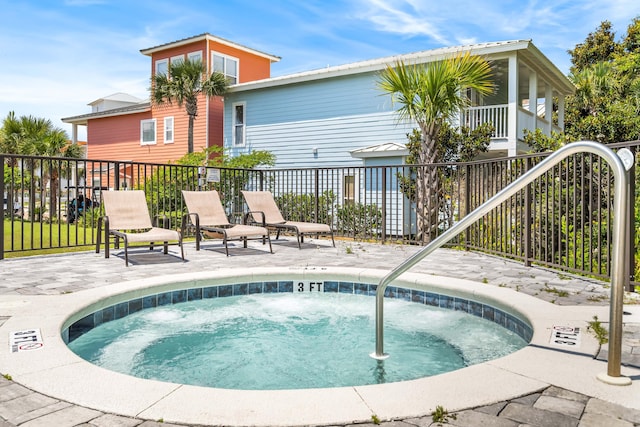 70 Martha S Ln # 2-101, Santa Rosa Beach, FL 32459 - view of swimming pool featuring a hot tub and a patio