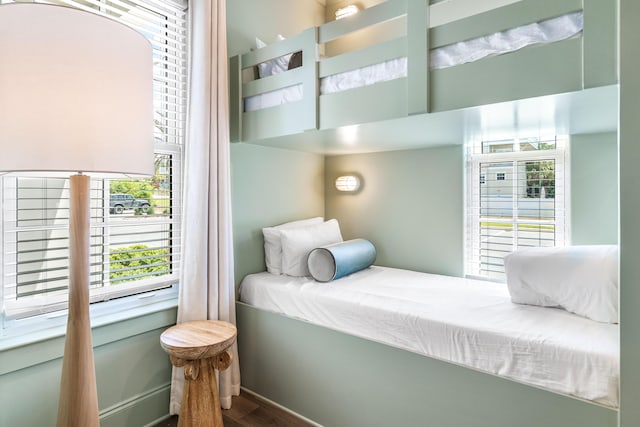 70 Martha S Ln # 2-101, Santa Rosa Beach, FL 32459 - bedroom with dark wood-style flooring and baseboards