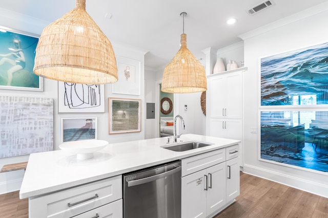 70 Martha S Ln # 2-101, Santa Rosa Beach, FL 32459 - kitchen with dishwasher, a sink, dark wood-type flooring, light countertops, and ornamental molding