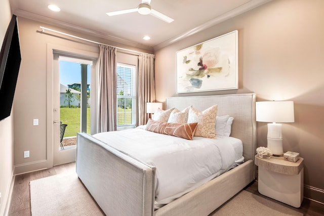 70 Martha S Ln # 2-101, Santa Rosa Beach, FL 32459 - bedroom featuring access to exterior, crown molding, baseboards, recessed lighting, and wood finished floors
