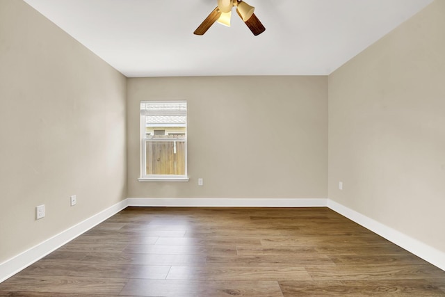 262 Bayou Bend Ln, Panama City, FL 32404 - unfurnished room featuring a ceiling fan, dark wood-style floors, and baseboards