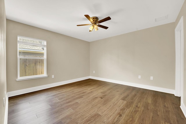 262 Bayou Bend Ln, Panama City, FL 32404 - empty room featuring ceiling fan, wood finished floors, and baseboards