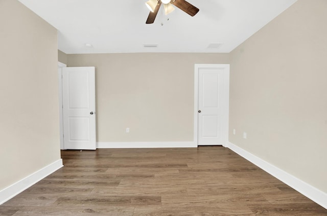262 Bayou Bend Ln, Panama City, FL 32404 - empty room featuring ceiling fan, wood finished floors, and baseboards