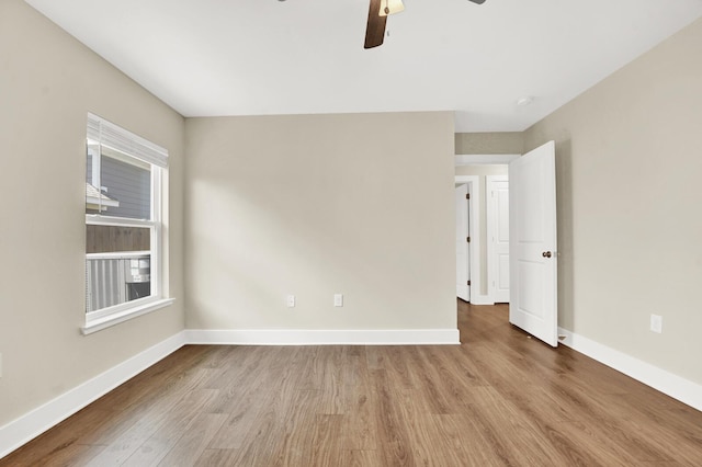 262 Bayou Bend Ln, Panama City, FL 32404 - spare room with wood finished floors, baseboards, and ceiling fan